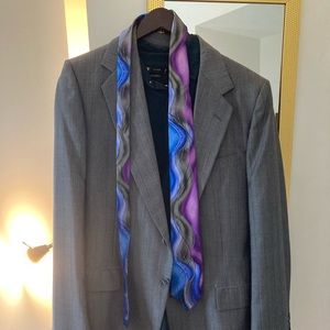 Suit coat, dress shirt, tie combo.